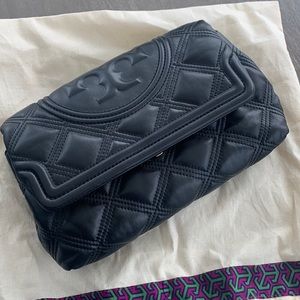 Tory Burch Fleming soft leather clutch. Carried maybe 2X’s. Excellent condition